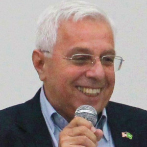 CARLOS R. BELANI GRAVINA